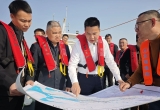 区长调研九龙江河口水质及生态环境